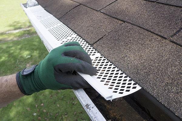 there are various types of gutter guards such as mesh, screen, and reverse curve guards, each with its own benefits